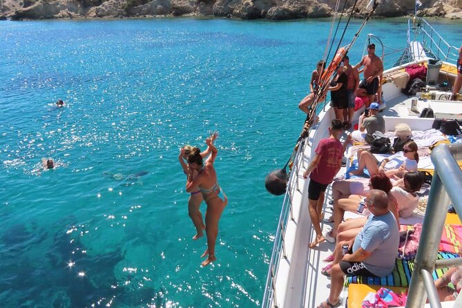 3 Island Cruise Tour in Kos Island with Personalized Audio Guide - Lunch, music, and the social side of the boat