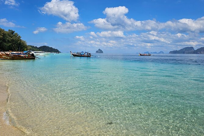 A full day Kradan + 4 island (By longtail Boat) - The morning begins with a hotel pickup