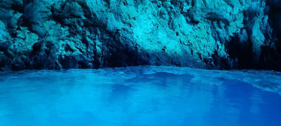 Blue Cave & Island-Hopping Tour with Snorkeling from Split - Entering the Blue Cave