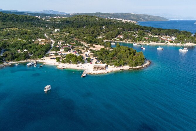 Blue Lagoon 3 Islands Tour with Lunch and Drinks Included - Čiovo Island and Branac Bay: lunch beside the water