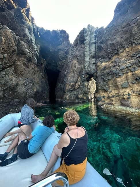 Boat Tour: Island hopping by dinghy with cave visits and snorkeling - Meeting at the Cristoforo Colombo seafront