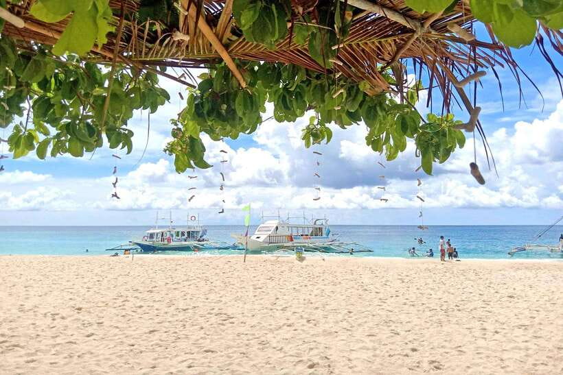 Boracay: Island Boat Tour with Crystal Cove Entry - Sailing past Crocodile Island
