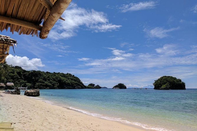 Boracay Island Hopping + Hot Kawa + Parasailing + Helmet Diving - The 20-minute helmet underwater session