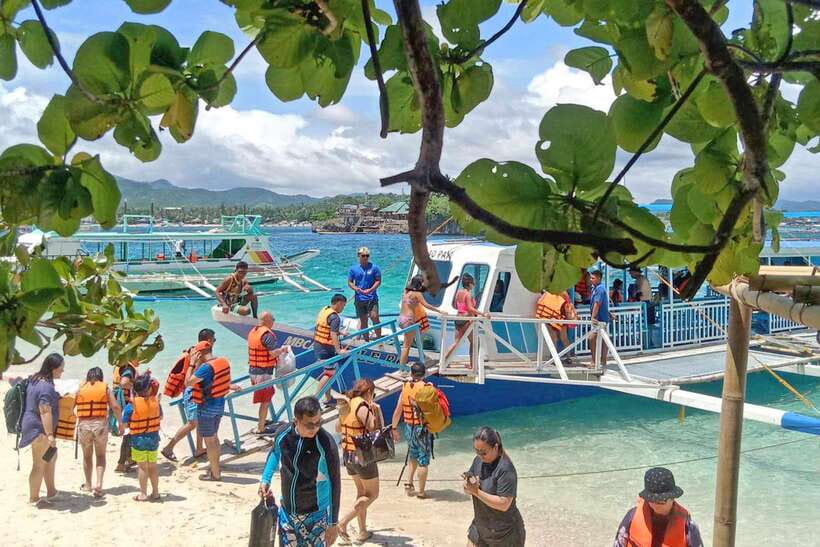Boracay: Island Hopping with Crystal Kayak & Helmet Diving - Island hopping along Boracay’s coast