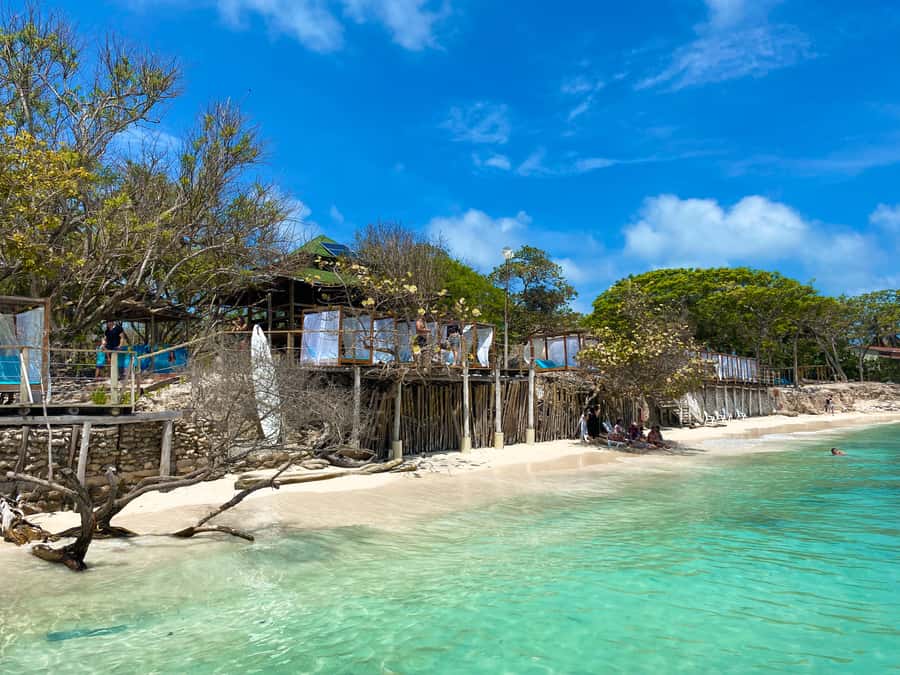 Cartagena: 5-Island Trip by Boat with Lunch and Snorkeling - Cholon: the party stop you may love or avoid