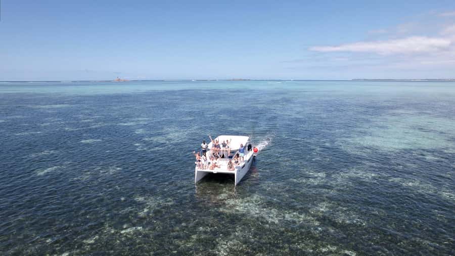 Catamaran Mauritius: South East 5 Islands Catamaran Cruises - Passing Ile aux Aigrettes