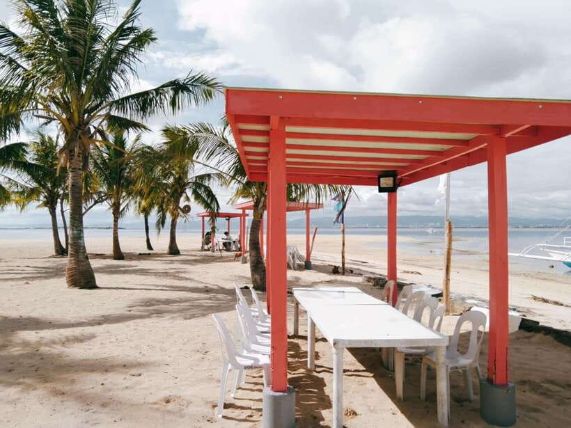 Cebu: Mactan Island Hopping Boat Tour with Lunch - Gilutungan Island Marine Sanctuary: the best stop for fish
