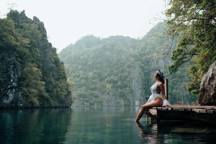Coron: Private Island-Hopping Tour on a Yacht or Speedboat - Twin Lagoon between towering limestone walls