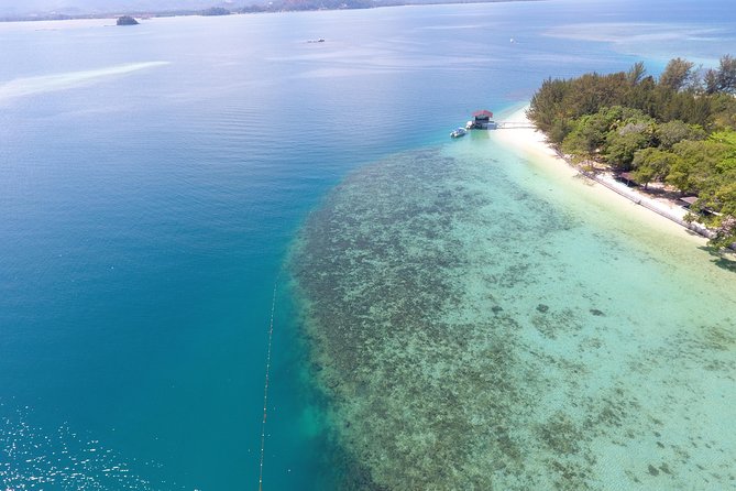 Dinawan Private Island Hopping by Speedboat from Kota Kinabalu Include Lunch - First snorkeling stop: a coral sea view