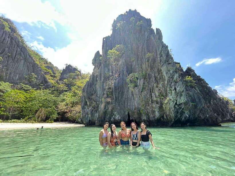 El Nido: Shared Island Hopping Tour C with Buffet Lunch - Hidden Beach turns swimming into the entrance