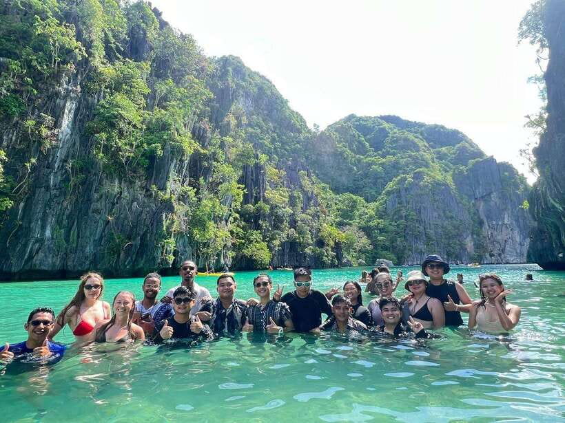El Nido: Shared Island Hopping Tour C with Buffet Lunch - Helicopter Island starts the day with coral and cliffs
