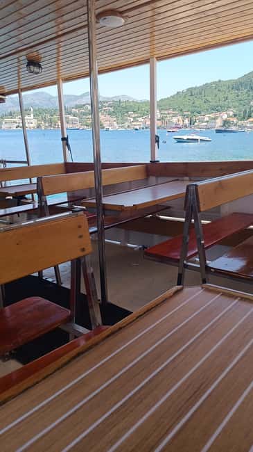 Elaphite Islands Cruise and Blue Cave Snorkeling Boat Tour - Koločep, sunlight, and the final return cruise