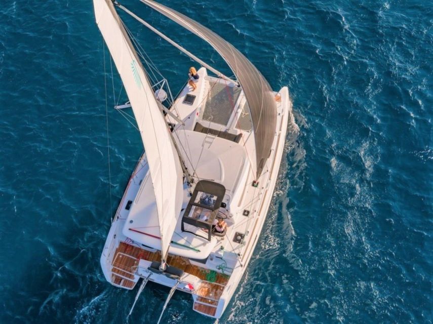 From Cannigione: Catamaran tour in La Maddalena Archipelago - Sailing toward Spargi Island