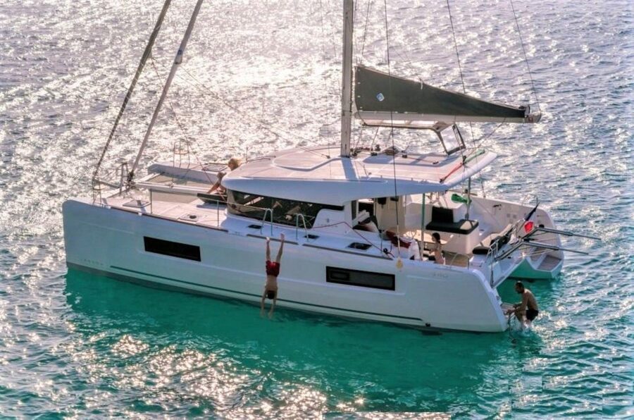 From Cannigione: Catamaran tour in La Maddalena Archipelago - Santa Maria, Razzoli, and Caprera