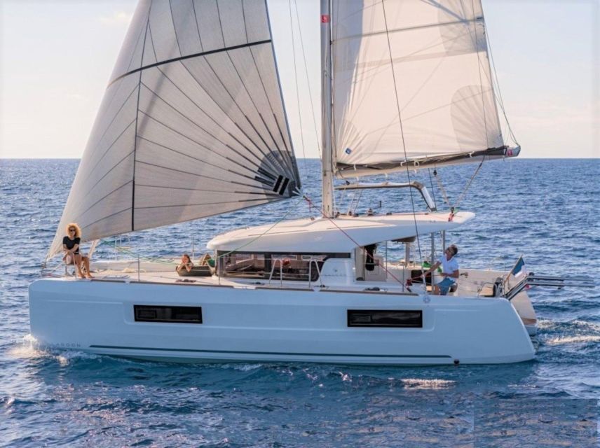 From Cannigione: Catamaran tour in La Maddalena Archipelago - What the boat offers during the day