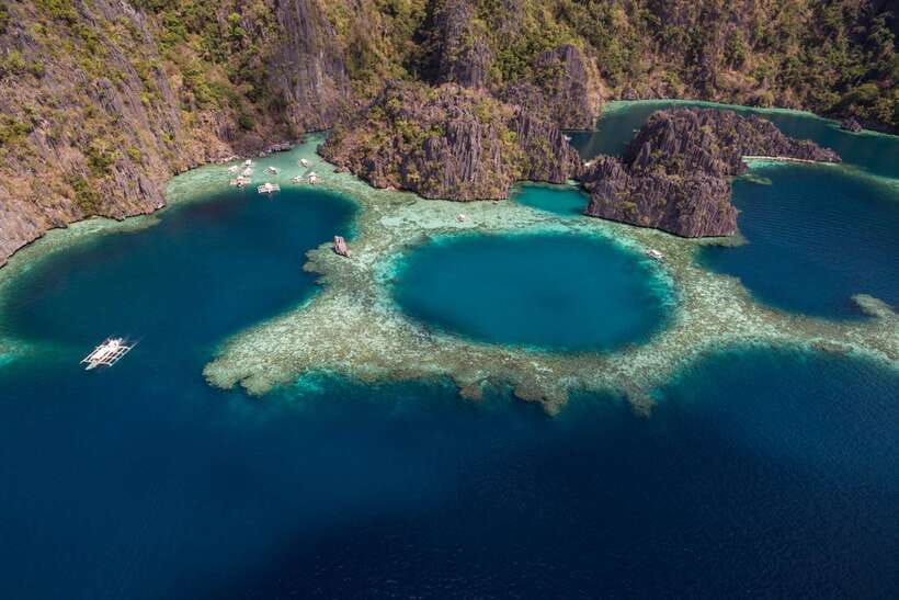 From Coron: Island Hopping Boat Day Trip with Buffet Lunch - Twin Lagoon adds a second kind of swim