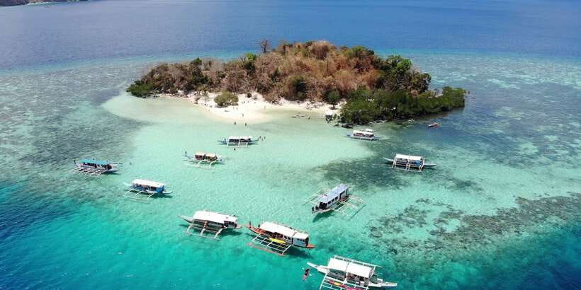 From Coron: Island Hopping Boat Day Trip with Buffet Lunch - Beach time ranges from CYC to Sunset Beach