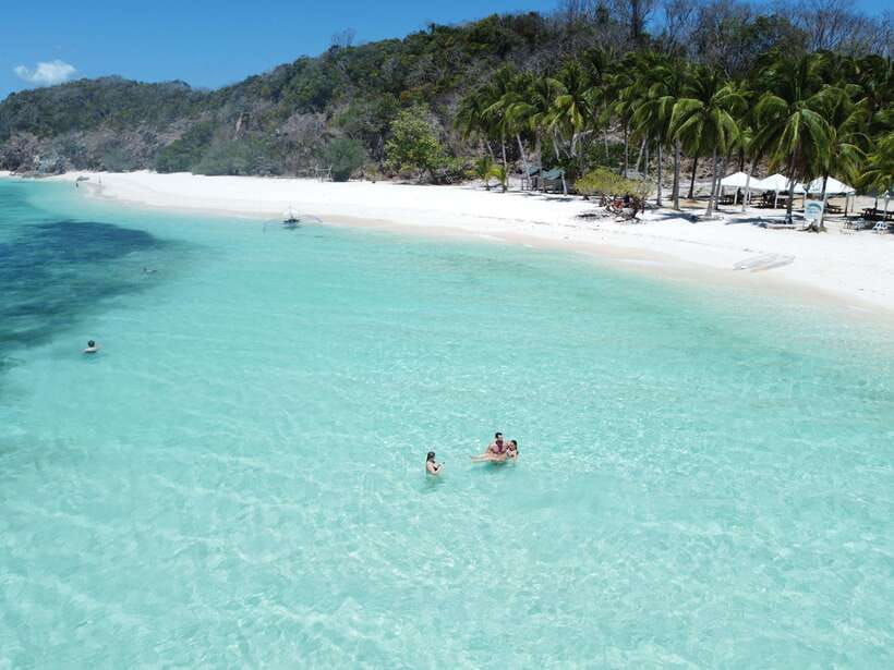 From Coron Town: Beaches and Islands Boat Tour with Lunch - Ditaytayan Island brings sandbar views first
