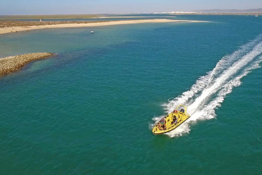 From Faro: Ria Formosa Hop-On Hop-Off 3 Islands Cruise - Farol Island: lighthouse views and a small seaside village