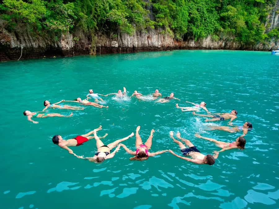 From Krabi: Phi Phi Early Bird & 4 Islands by Speedboat - Food, guides, and the human side of the trip