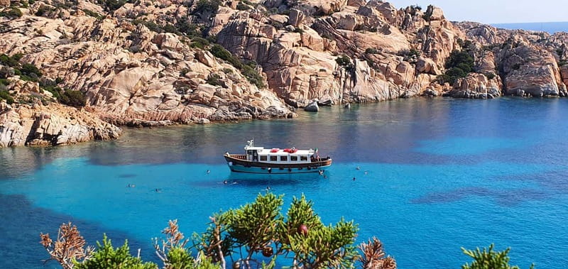 From La Maddalena or Palau: Archipelago Boat Tour - Santo Stefano and the passage beneath Caprera bridge