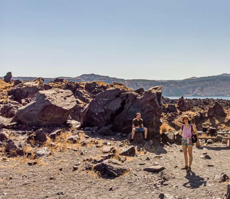 From Old Port:Volcanic Islands Boat Trip & Hot Spring Visit - Reaching the Old Port below Fira