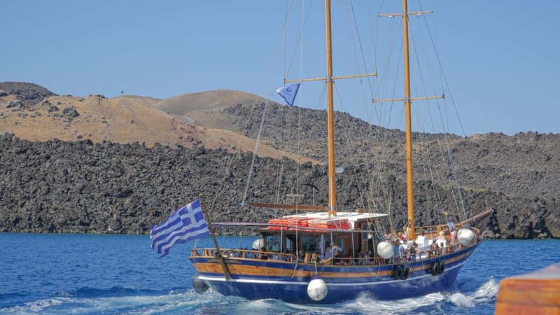 From Old Port:Volcanic Islands Boat Trip & Hot Spring Visit - The boat ride into Santorini’s volcanic caldera