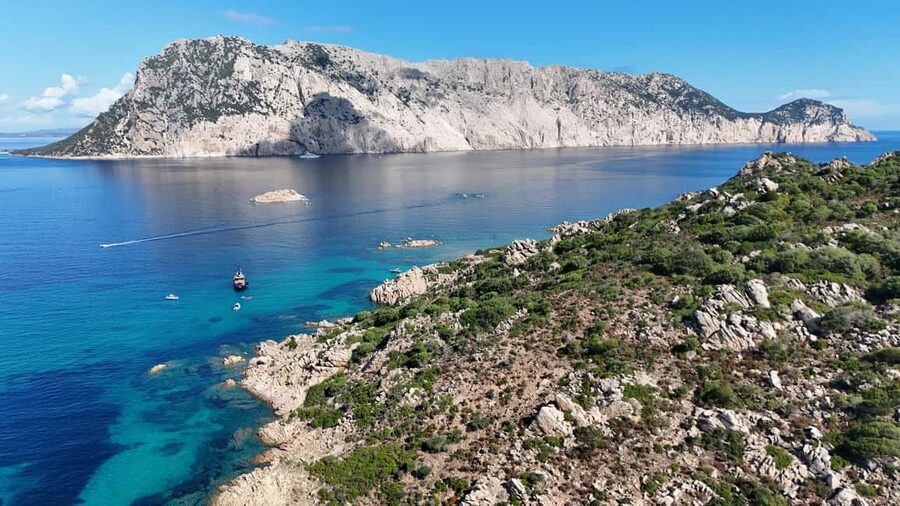 From San Teodoro: Tavolara Archipelago Dinghy Grand Tour - Tavolara Island, cliffs, and Cathedral Cave