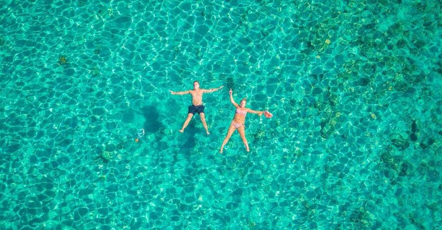 From Split: Blue Cave & Coastal Highlights Private Boat Tour - Komiža brings you back to everyday island life