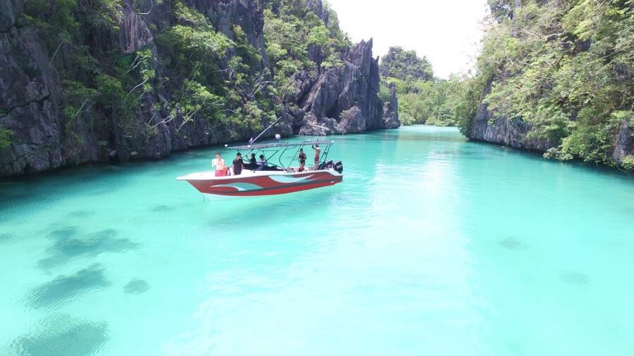 Half-Day Seasation Premium Speedboat Group Island Hopping - The premium boat ride and the El Nido setting