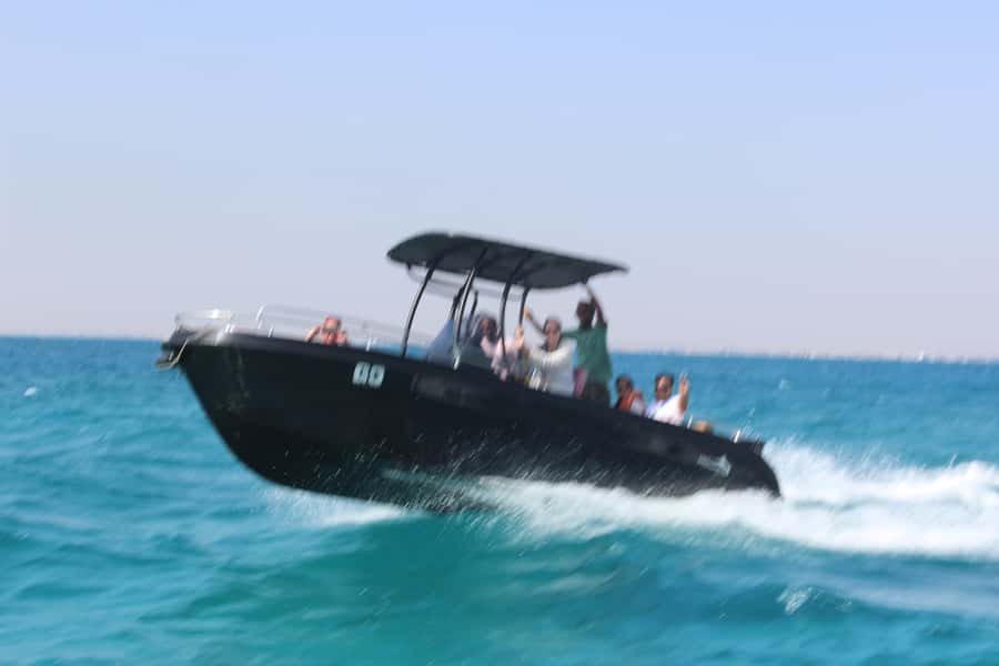 Hurghada: 4 Island Hopping Tour Dolphin, Snorkeling & Lunch - Searching for dolphins in open water