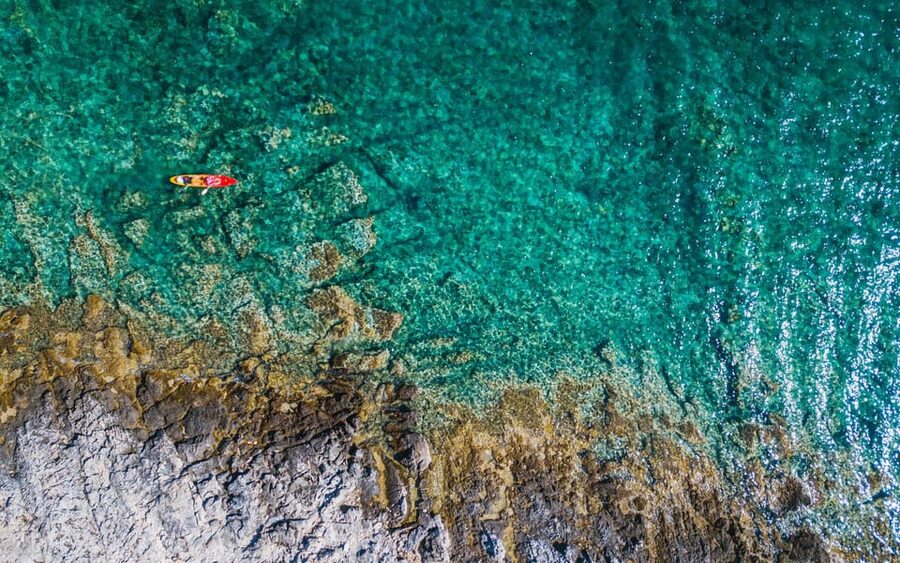 Korcula Archipelago Kayak Tour - Paddling through passages and along the rocky coast