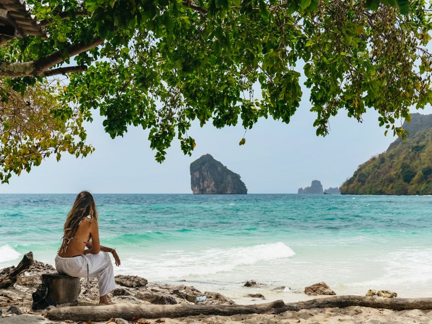 Krabi: 4 Islands Tour by Longtail Boat & Thai Buffet Lunch - Railay and Phra Nang: cliffs, sand, and a small shrine
