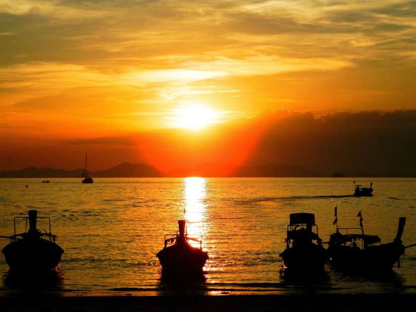 Krabi: 7 Islands Sunset Tour with Buffet Dinner & Snorkeling - Leaving Ao Nang by traditional longtail boat