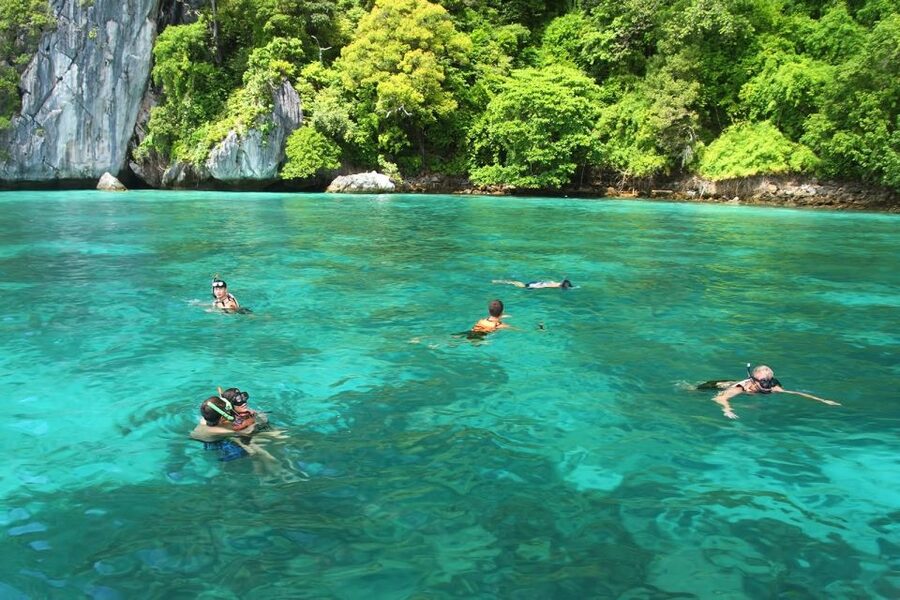 Krabi: Phi Phi Island Sunset Maya Bay and Four Islands Tour - Walking from Loh Samah Bay to Maya Bay