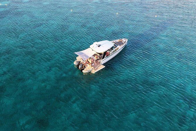 Luxury cruise to the archipelago of La Maddalena and Costa Smeralda - Leaving Poltu Quatu at the start of the day