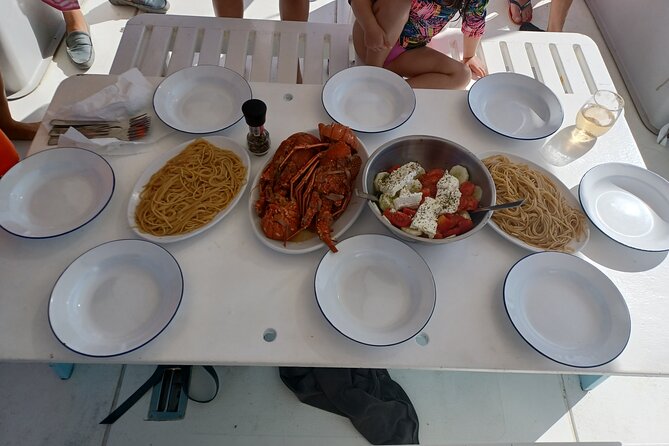 Naxos private fishing trips, lunch on board & island hopping - Swimming, snorkeling, and a cave stop
