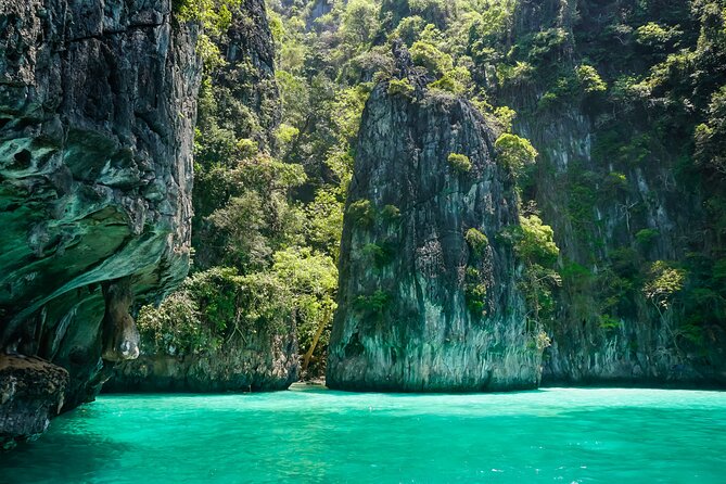 Phi Phi 4 Islands Sunset Tour with Bioluminescent Plankton - Maya Bay, the movie-famous opening stop
