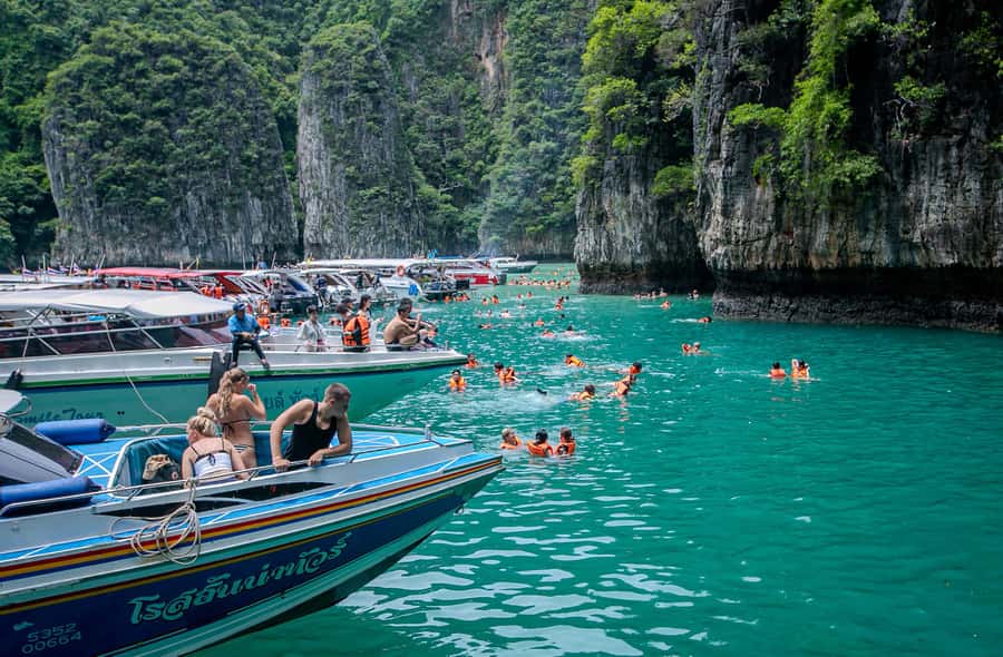 Phi Phi: 7 Islands Speed Boat Tour with Sunset and Plankton - Pileh Lagoon is your best swim stop