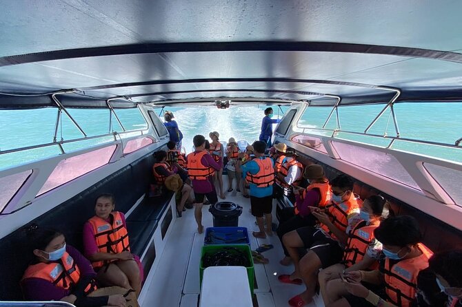Phi Phi Island Hopping Day Trip by Speed Boat from Phuket - Pi Leh Bay beneath 100-meter cliffs