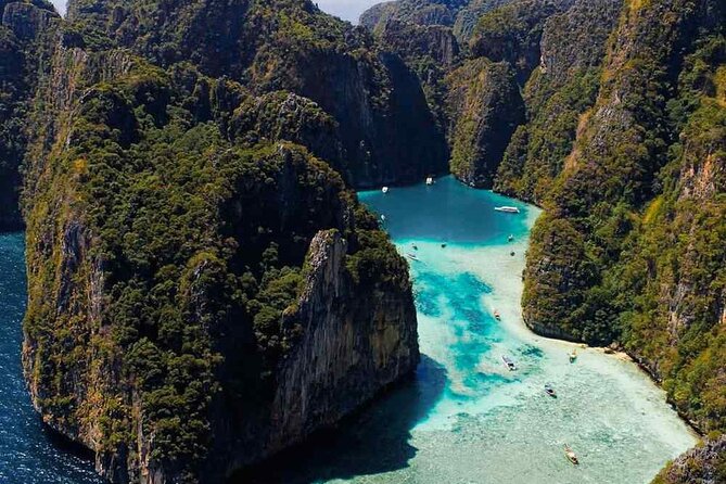 Phuket: Phi Phi Islands, Maya bay & Khai Island Tour by Speedboat - Khai Nai Island finishes with fish and coral