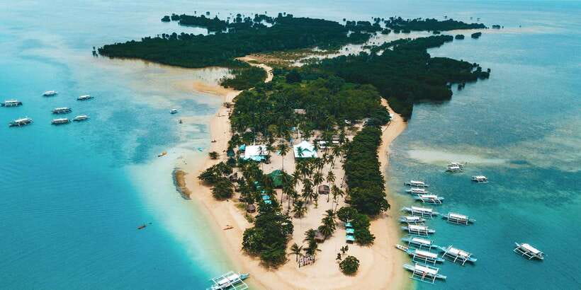 Puerto Princesa: Honda Bay Island Hopping & Optional Massage - Cowrie Island: Lunch, Swimming, and Time to Slow Down