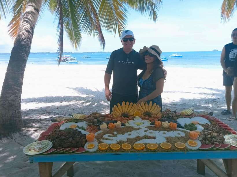 Siargao:Tri Island Hopping Naked Island, Daku, Guyam w/Lunch - Daku Island and the banana-leaf lunch