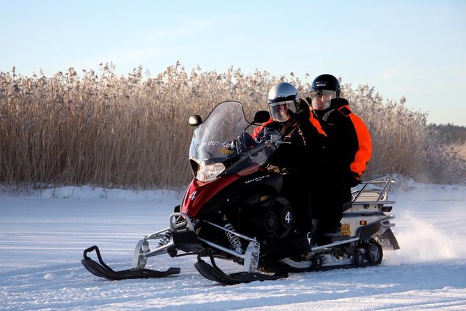 Snowmobile Safari in Helsinki Archipelago with Lunch - Snowmobile tracks through forests, fields, and frozen sea
