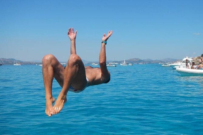 Tavolara San Teodoro's 5 Island and Beach Tour - The final swim at Spiaggia Capo Coda Cavallo