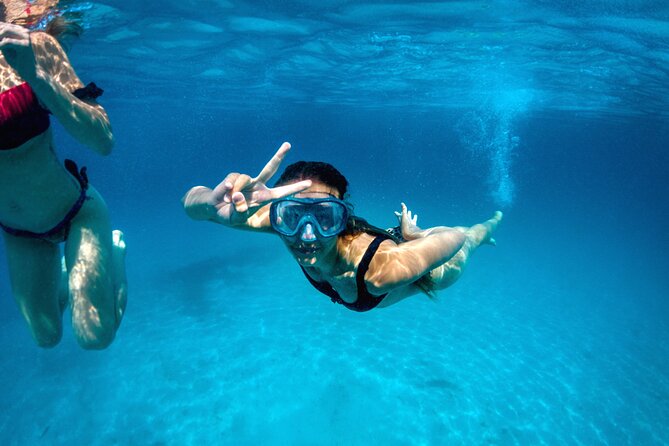 Two Islands Blue Lagoon Half-Day Boat Tour from Split - Krknjaši Bay: Your First Hour in the Water